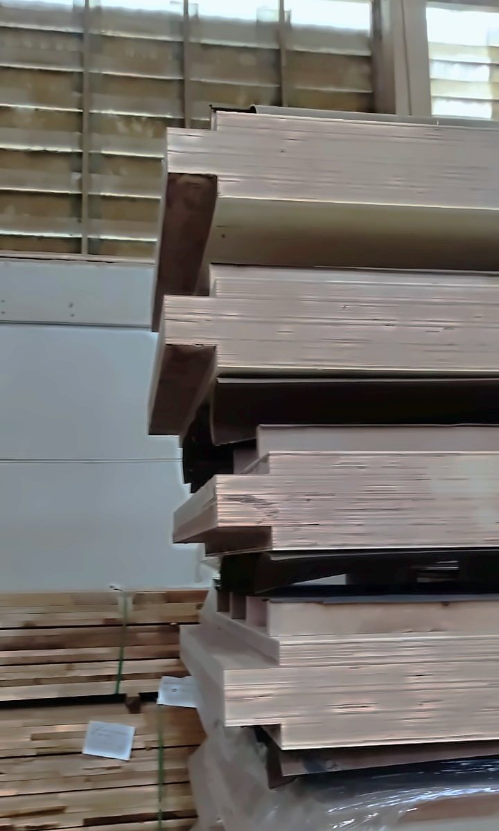 Stack of finished multi-glued LVL panels showing their layered edges