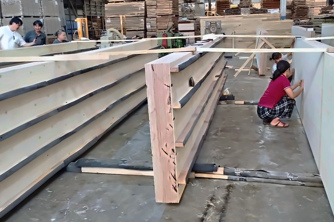 Team assembling 180 millimetre multi-glued LVL panels in the factory